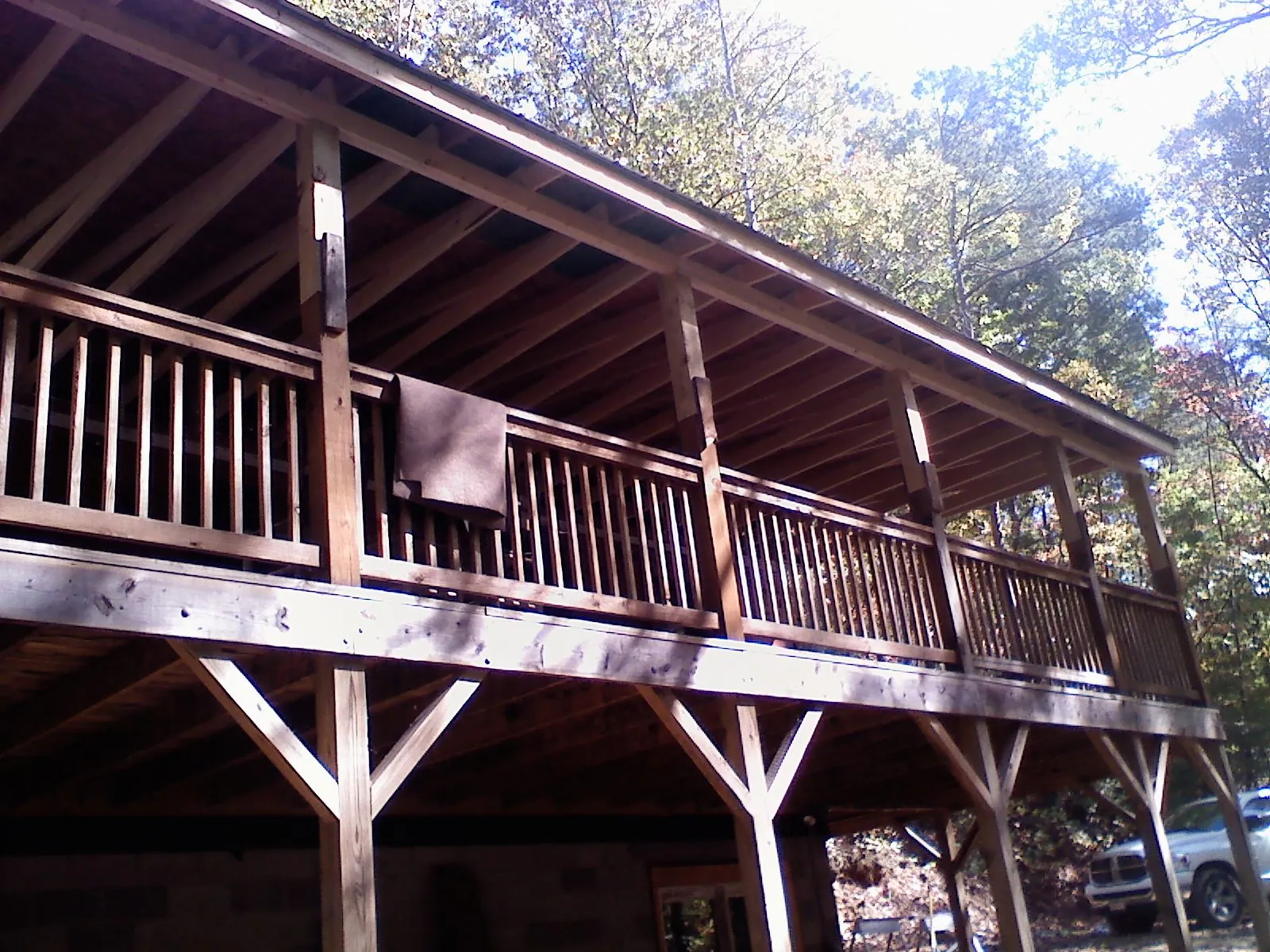 Timber framing under a new elevated porch and deck — Roof Leak Repair in Santa Ana by Roofing Brothers